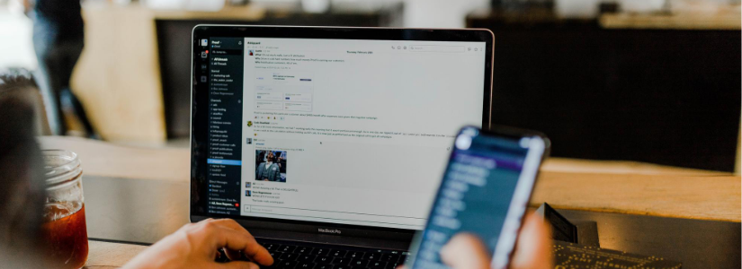 This person is working remotely because of the quarantine from her house working from home she has her laptop and is adapting to the agile methodology in a remote work environment learning about nearshore outsourcing